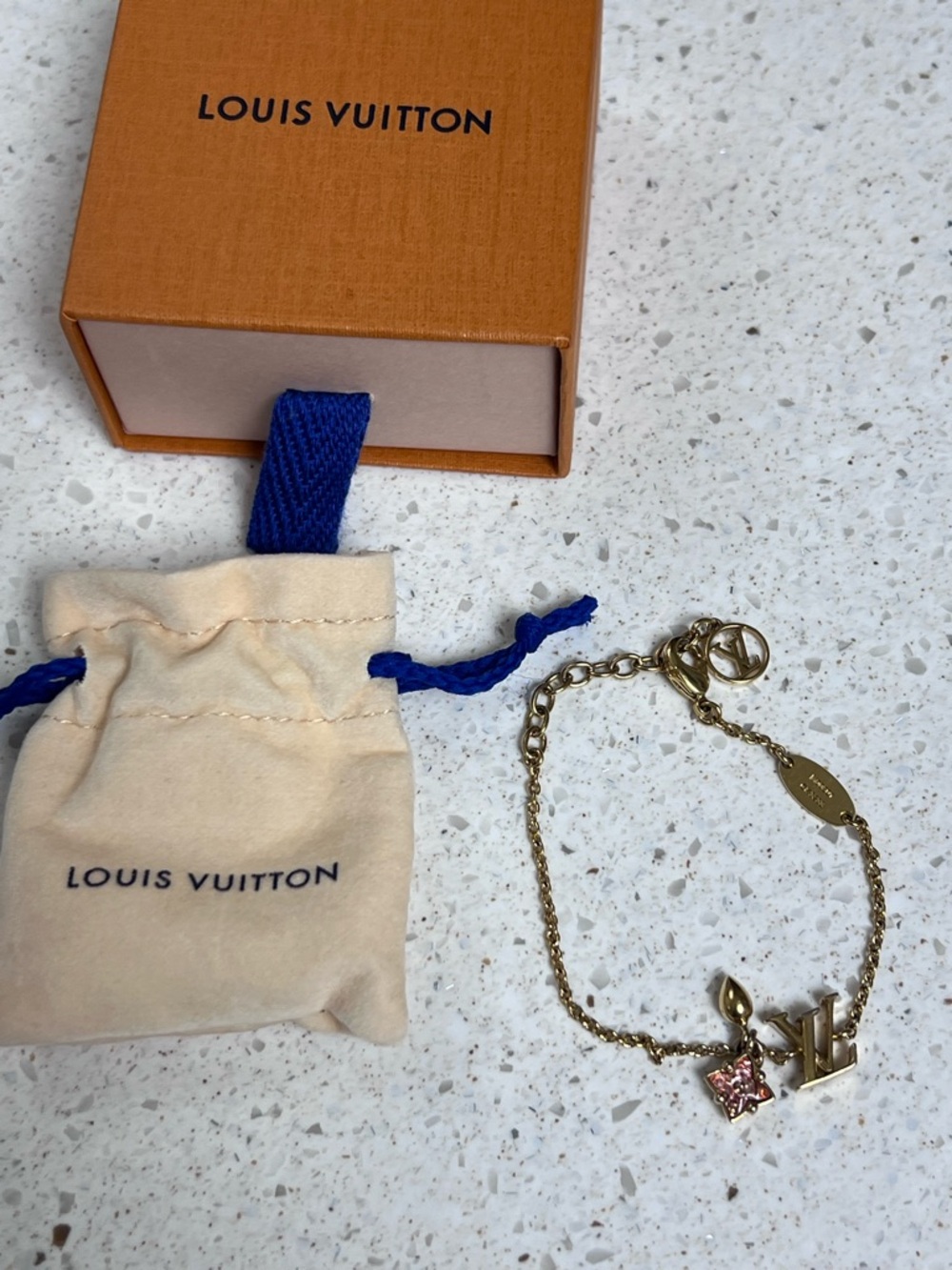 Louis Vuitton Gold Charm Bracelet with Pink Accent